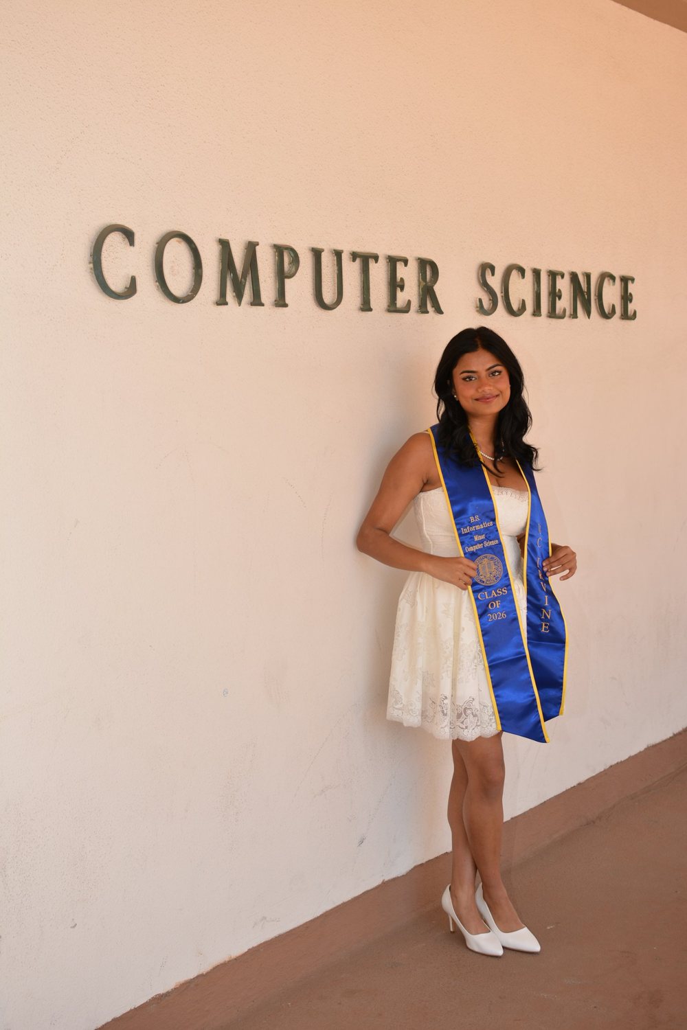 Parboni in her UC Irvine Class of 2026 stole under the Computer Science sign